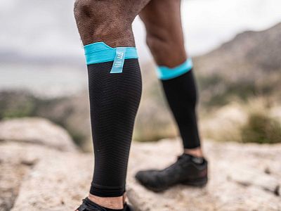 SU00003B_990-Compressport-R2-Oxygen-black-compression